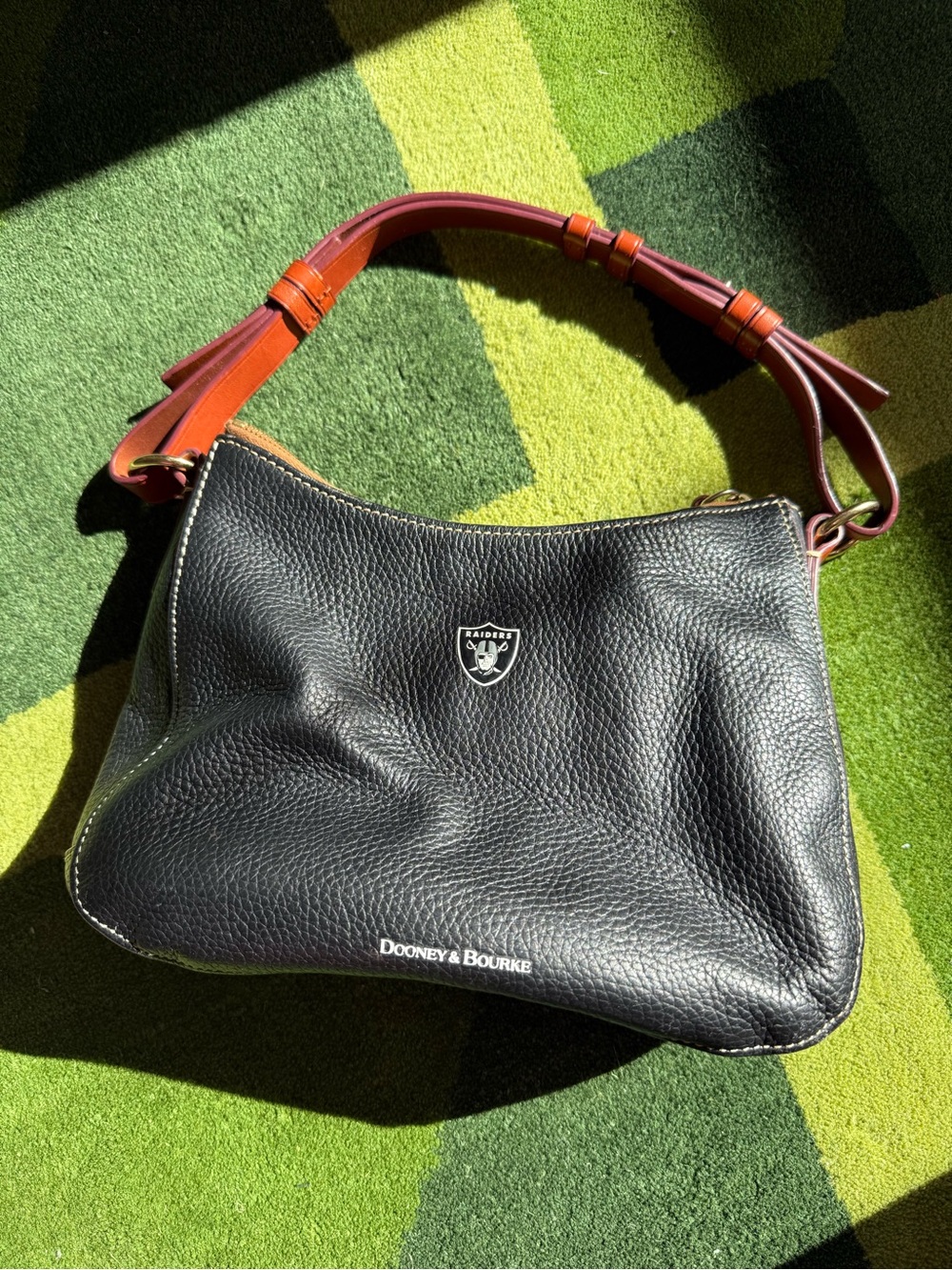 Dooney & Bourke Raiders Black Pebble Leather Hobo Bag with Brown Strap